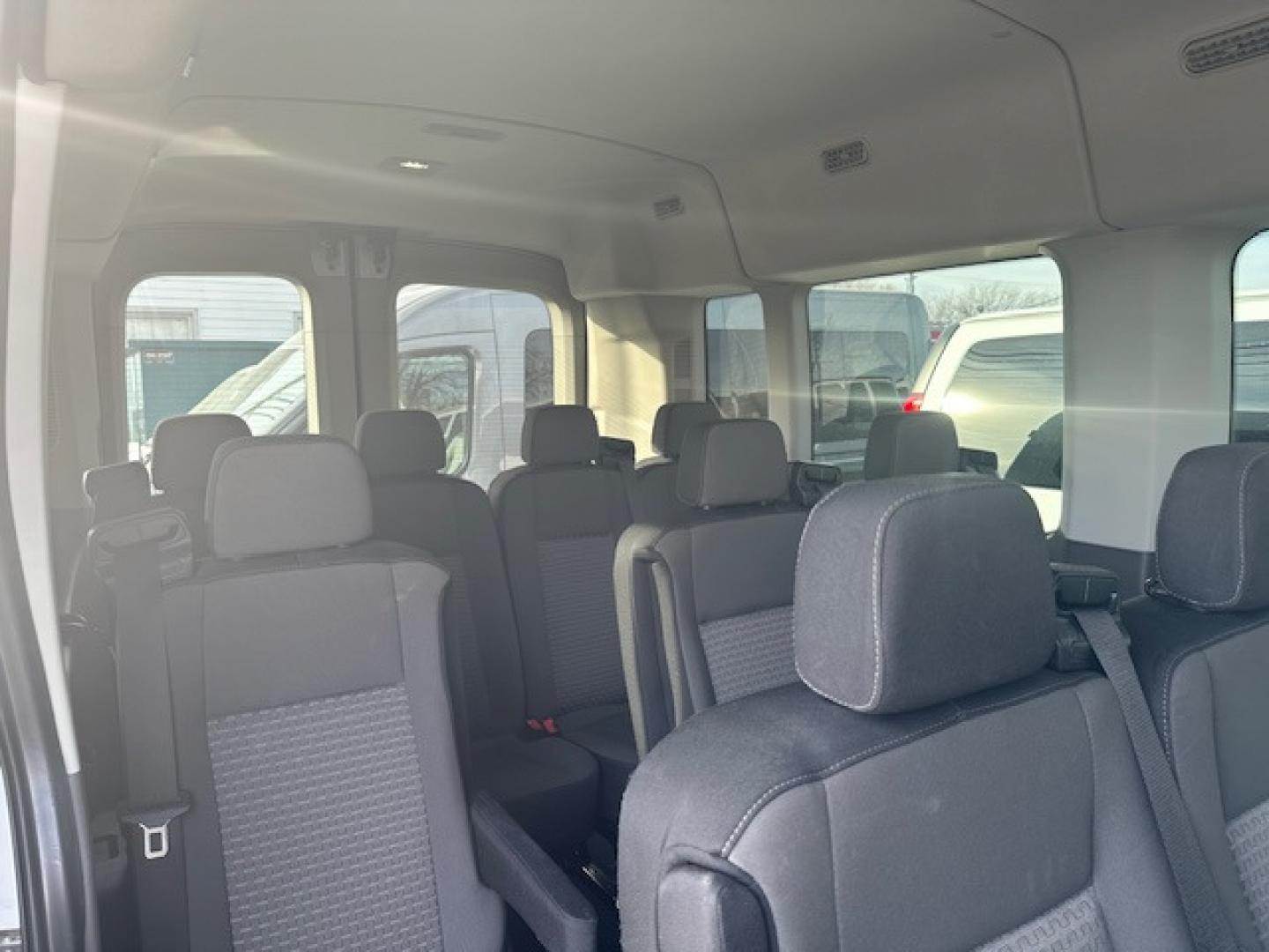 2022 White /Gray Ford Transit 350 Wagon Med. Roof XLT w/Sliding Pass. 148-in. WB (1FBAX9C85NK) with an 3.5L V6 DOHC 24V engine, 6A transmission, located at 3200 1st Avenue North, Billings, MT, 59101, (406) 245-9055, 45.779270, -108.510742 - This is One of Our Super Vehicles Available for Rent. 12 Passenger Seating, Power Heated Seats, Tilt Steering, Cruise Control, Air Conditioning, Towing, All Wheel Drive, Larger Fuel Tank, and Many More Custom Options! CarFax Dealer Auto Brokers of Montana/AA&A Auto Rental/Fox Car Rental Billings - Photo#3